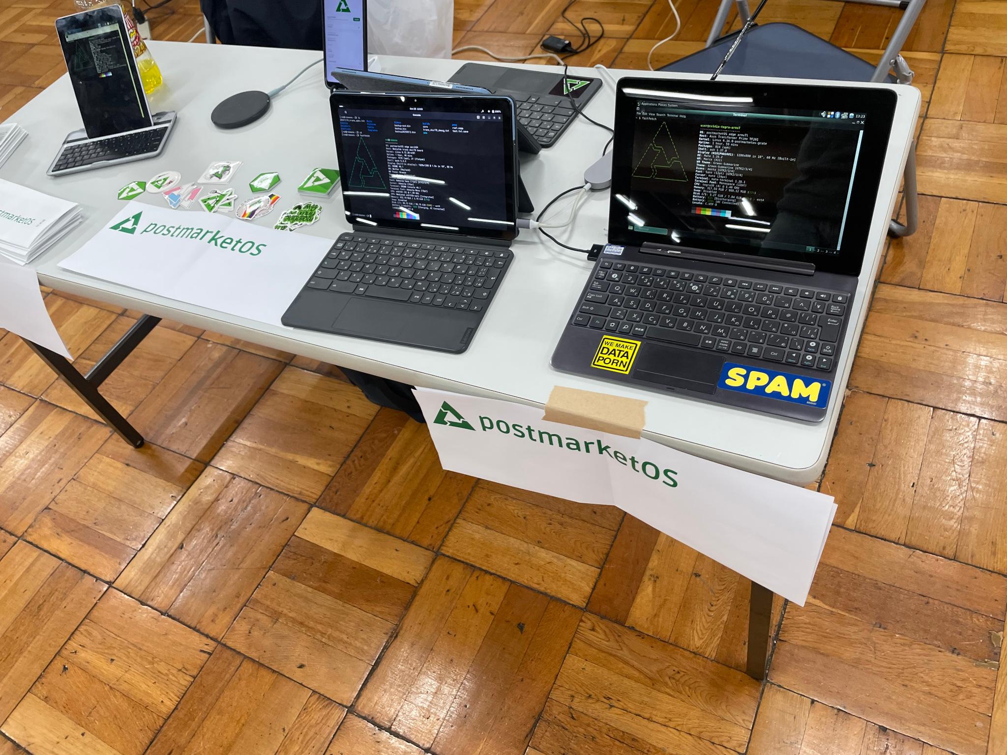 More focussed shot, showing two devices running pmOS and showing neofetch data